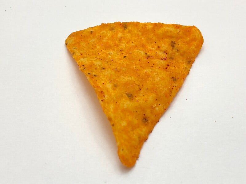 The classic Dorito, a beloved snack for many.