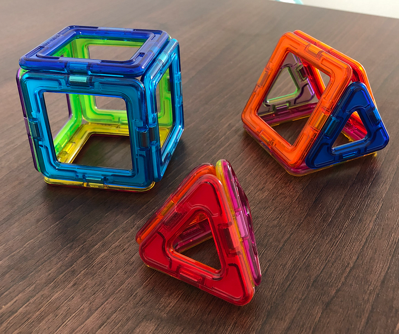 Illustrations of a Cube, Tetrahedron, and a mixed-face polyhedron.