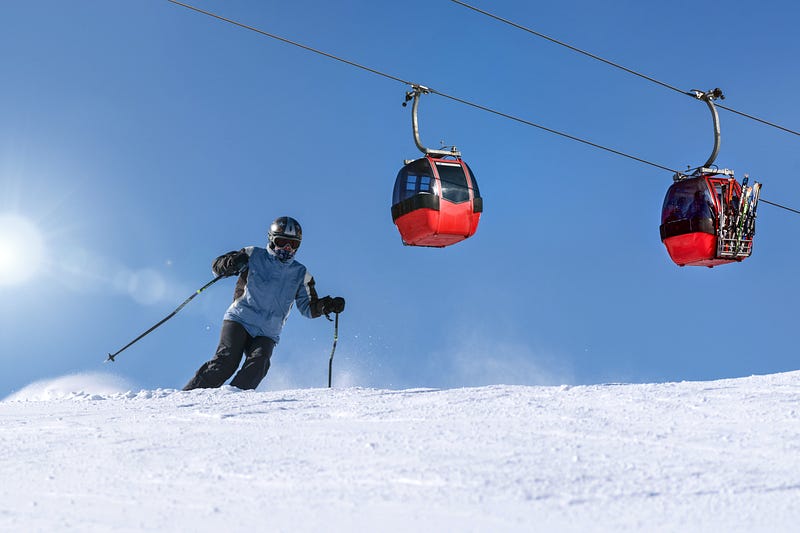 Skiers enjoying the slopes in the Alps